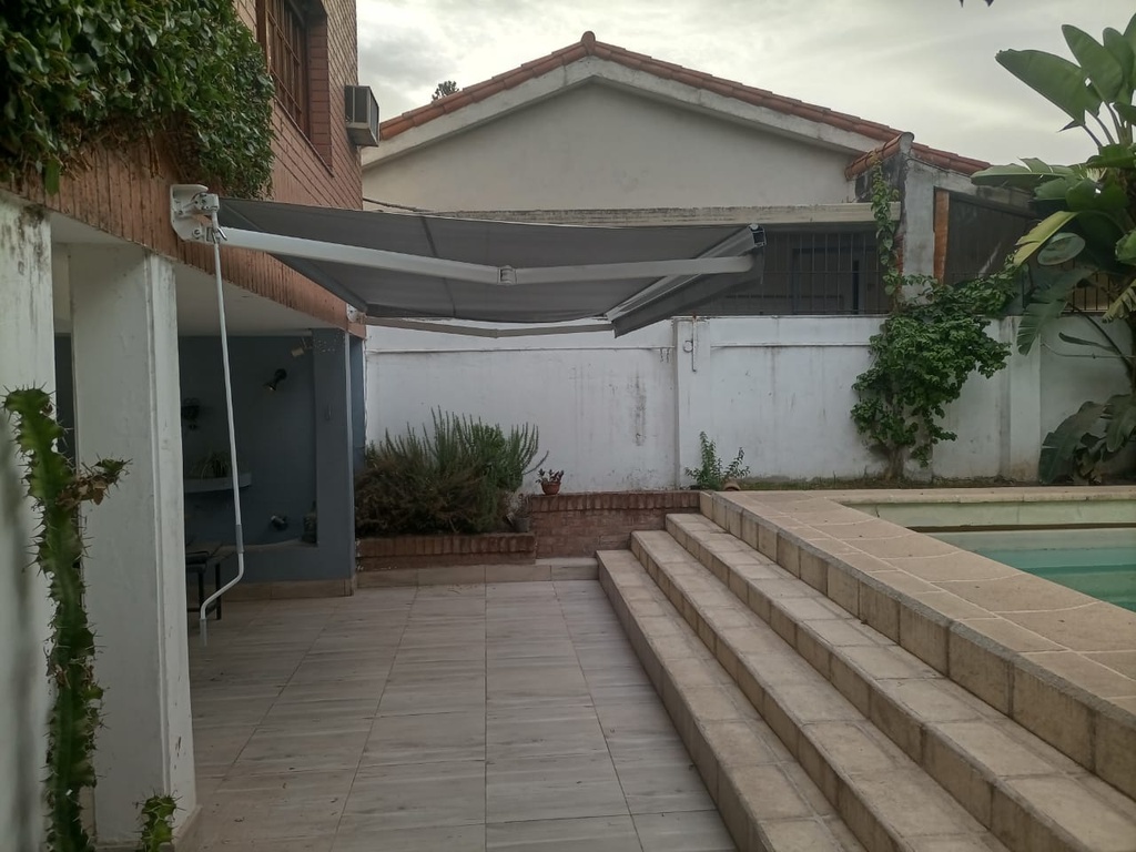 Toldo Lona con brazo invisible
