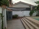 Toldo Lona con brazo invisible