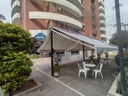 Toldo Lona con brazo invisible